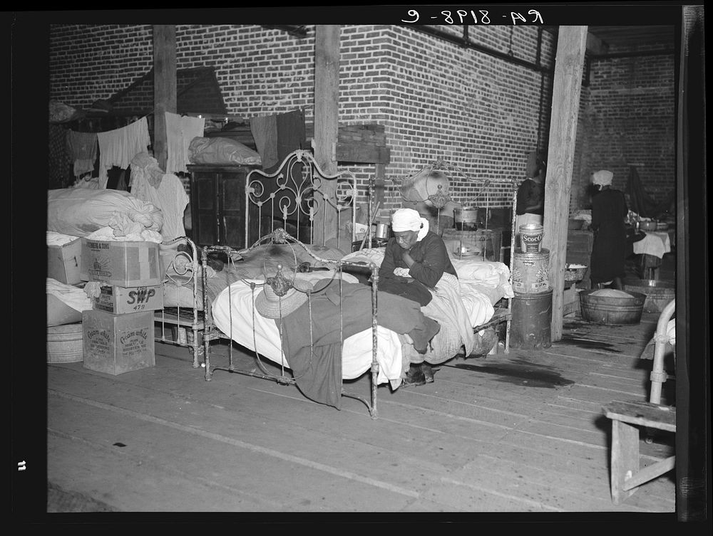 Sick flood refugee in the Red Cross temporary infirmary at Forrest City, Arkansas. Sourced from the Library of Congress.