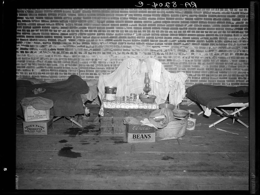 Household goods of a  flood refugee in the temporary infirmary. Forrest City, Arkansas. Sourced from the Library of Congress.