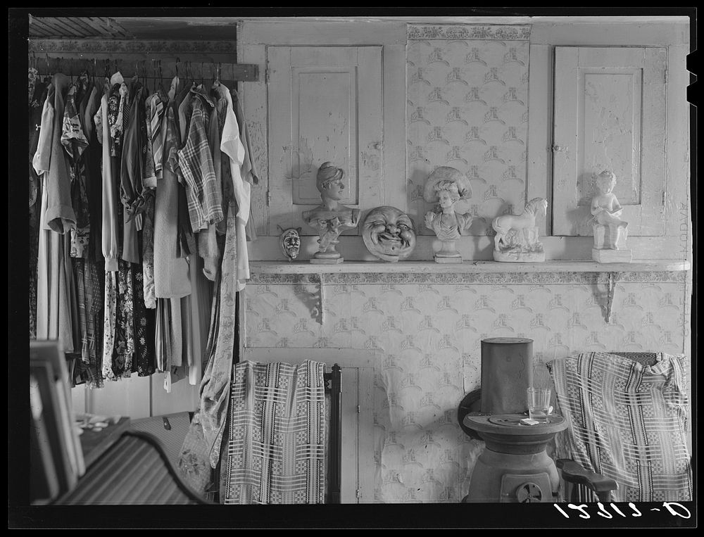 Tourist house, Truro. Interior of tourist bedroom. Clothes and half-filled whisky glass belong to tourists. Truro…