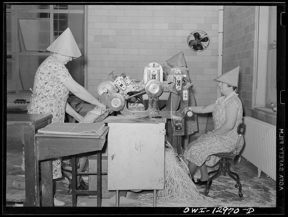 Washington, D.C. 400-subject two-way postage stamp perforating machine at the United States Bureau of Engraving and…