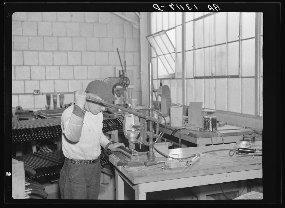 Employees in the vacuum cleaner factory. Arthurdale project, Reedsville, West Virginia. Sourced from the Library of Congress.