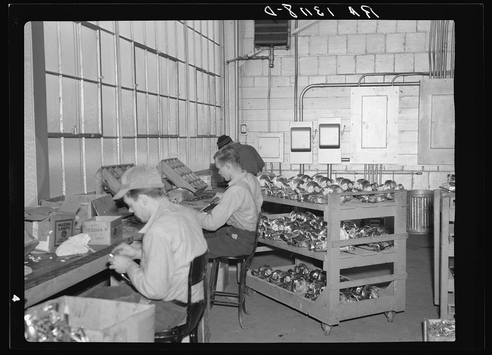 Workers in the vacuum cleaner factory at Reedsville, West Virginia. Many of the employees are Arthurdale homesteaders.…