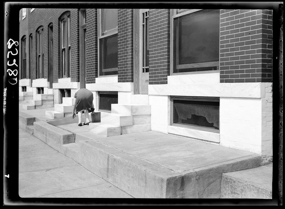 [Untitled photo, possibly related to: Scrubbing white steps. Baltimore, Maryland]. Sourced from the Library of Congress.