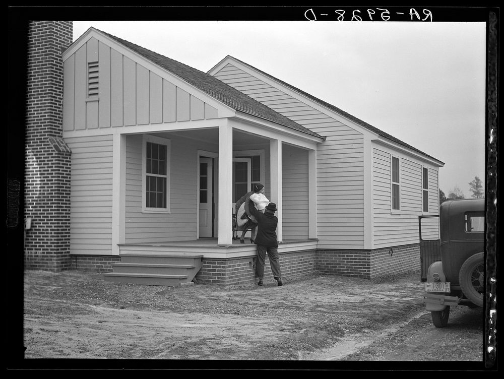 [Untitled photo, possibly related to: The Howard family moving into their new home at Gardendale, Alabama]. Sourced from the…