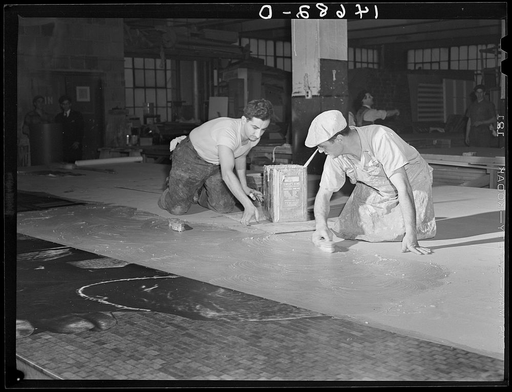 New York, New York. Preparing the defense bond sales photomural, designed by the Farm Security Administration Administration…