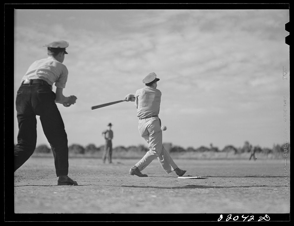 [Untitled photo, possibly related to: Weslaco, Texas. FSA (Farm Security Administration) camp. Baseball game. Saturday…