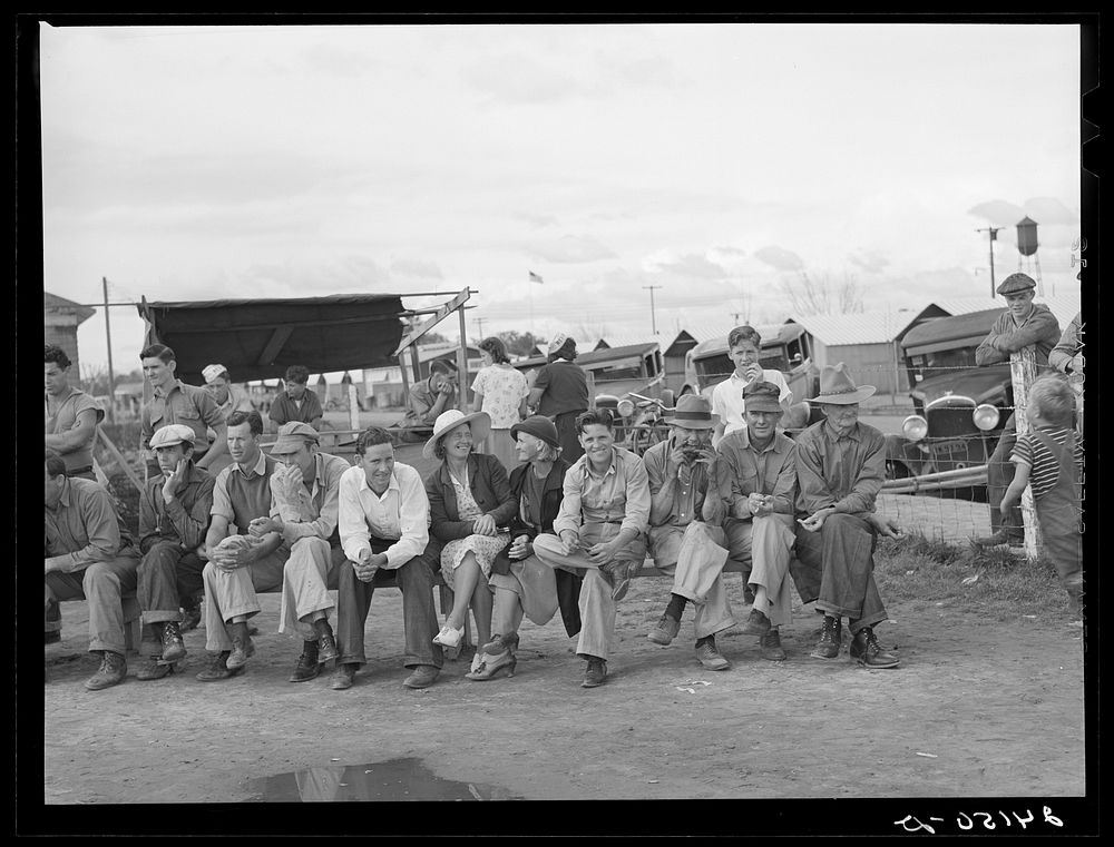 [Untitled photo, possibly related to: Watching baseball game. Tulare migrant camp. Visalia, California]. Sourced from the…