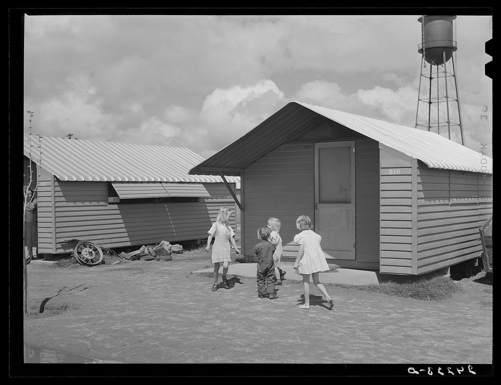 Children playing. Tulare migrant camp. Visalia, California. Sourced from the Library of Congress.