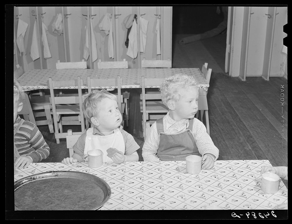 Children are given afternoon lunch in nursery. Shafter migrant camp.  Shafter, California. Sourced from the Library of…