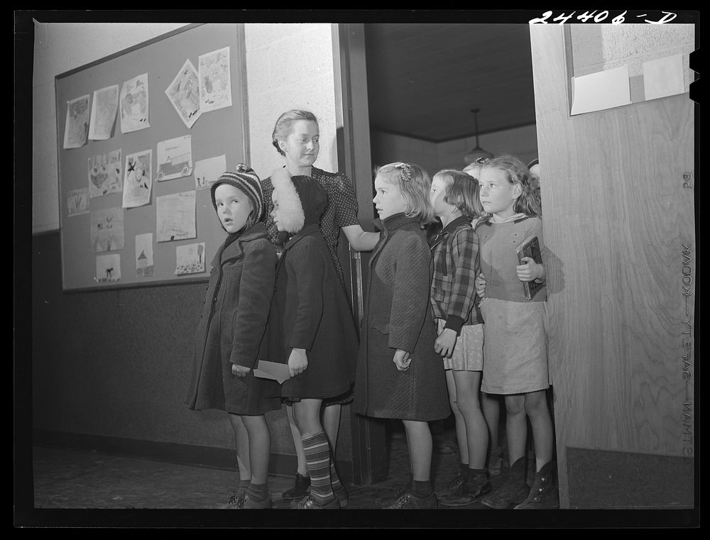 Second grade class leaving for school bus. Daily, West Virginia. Sourced from the Library of Congress.