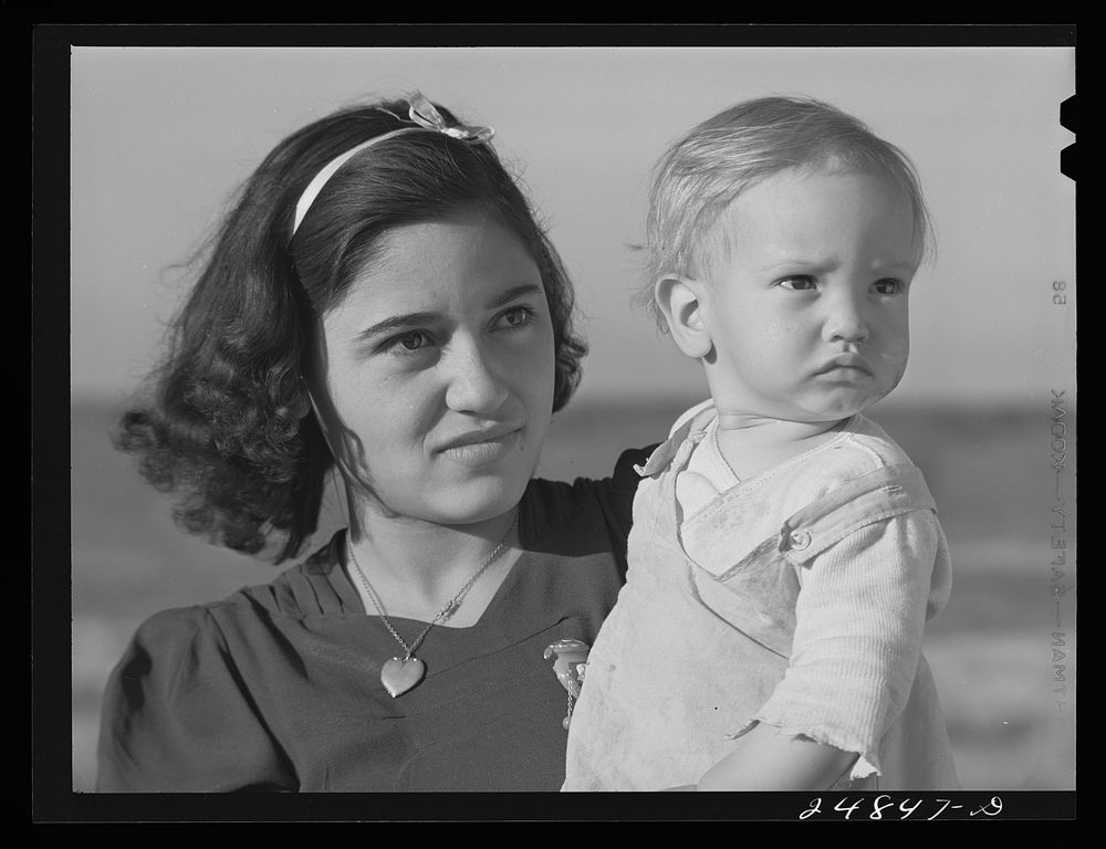 Migratory worker's wife and child. FSA (Farm Security Administration) camp, Robstown, Texas. Sourced from the Library of…