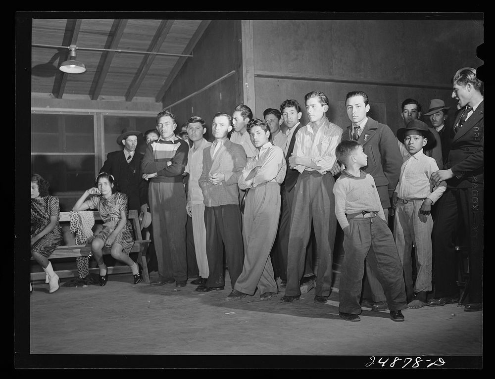 Stag line at Saturday night dance. Robstown camp, Texas. Sourced from the Library of Congress.
