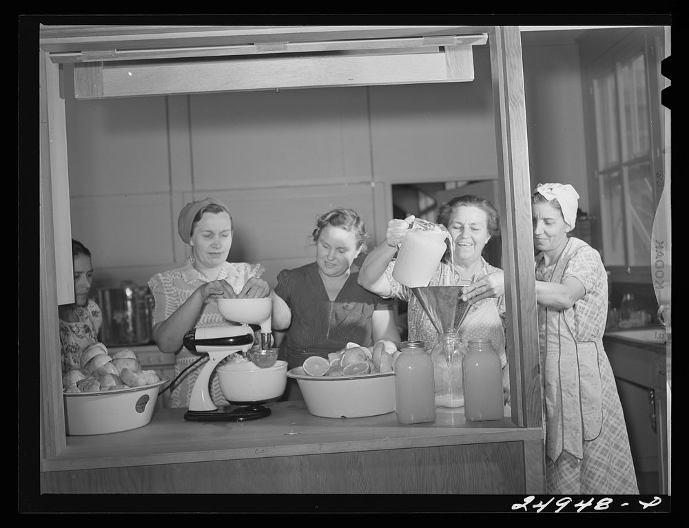 Harlingen, Texas. FSA (Farm Security Administration) camp. Canning grapefruit for hot weather use. Community kitchen.…