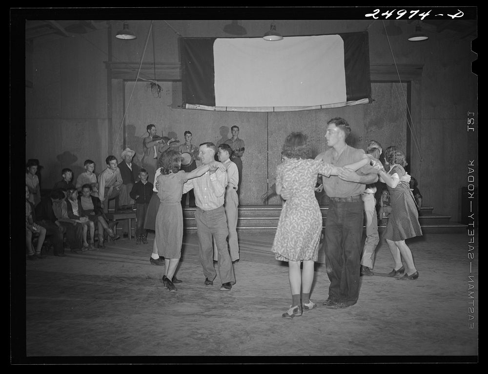 [Untitled photo, possibly related to: Weslaco, Texas. FSA (Farm Security Administration) camp. Square dancing, Saturday…