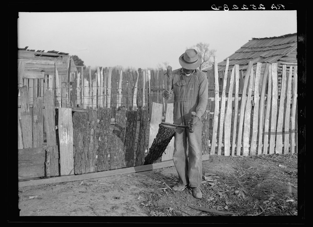 Gees Bend  splitting wood. Alabama. Sourced from the Library of Congress.