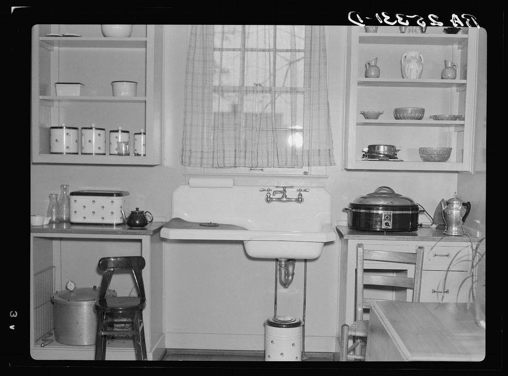 [Untitled photo, possibly related to: Kitchen in one of the Gardendale Homesteads, Alabama]. Sourced from the Library of…