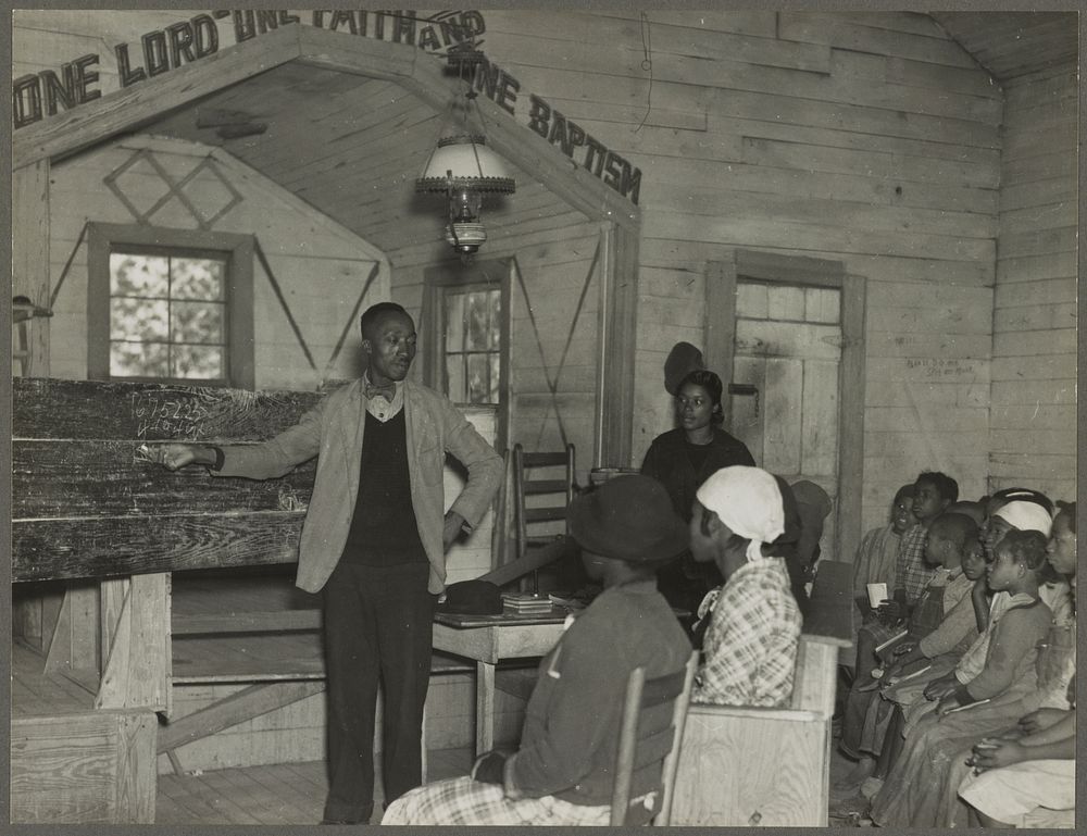 Conducting school in the church. Gees Bend, Alabama. Sourced from the Library of Congress.