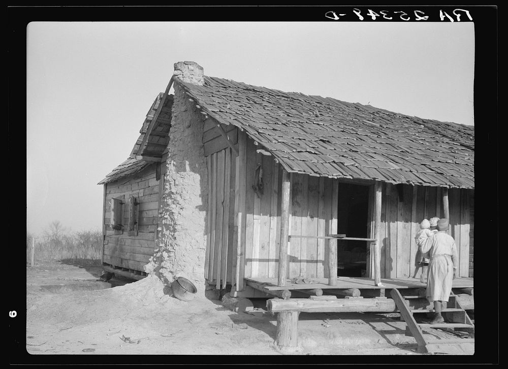 Cabin with mud chimney. Gees Bend, Alabama. Sourced from the Library of Congress.