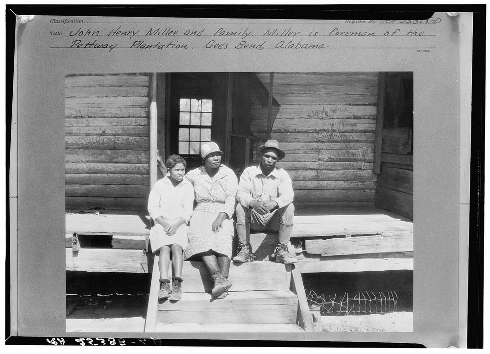 John Henry Miller and family. Miller is foreman of the Pettway Plantation. Gees Bend, Alabama. Sourced from the Library of…