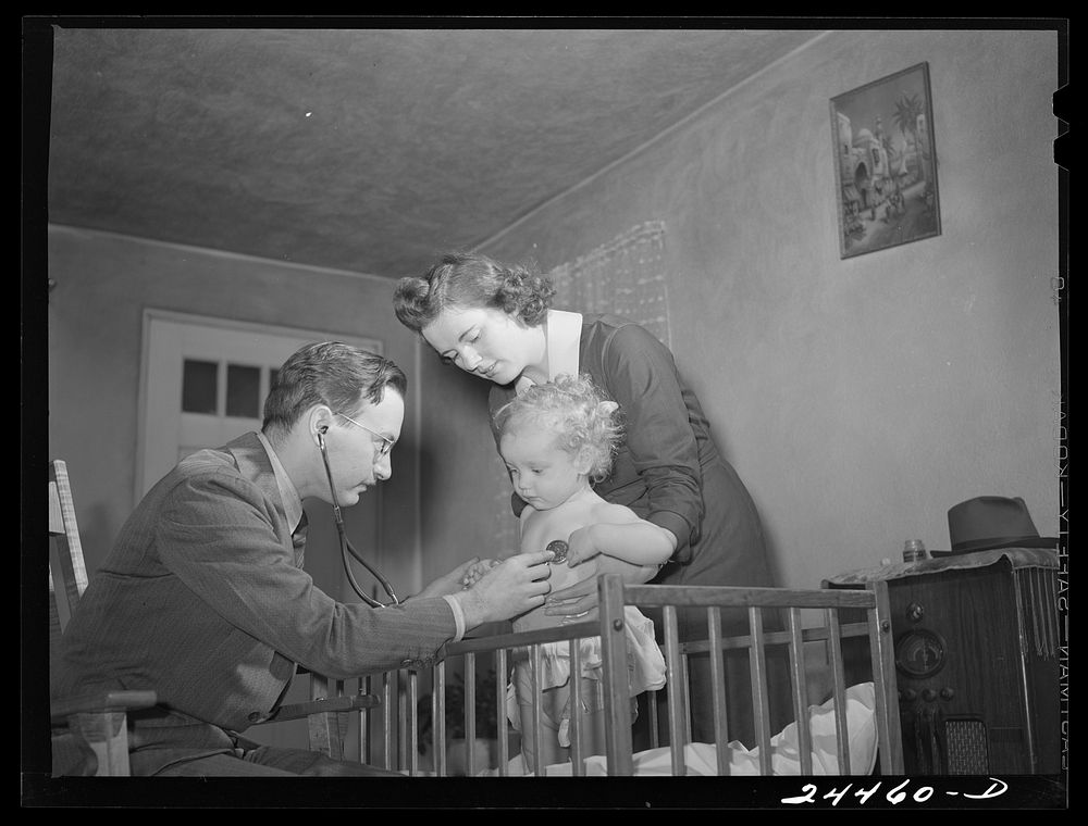 Doctor Tabor examining Roscoe Loudin. Dailey, West Virginia. Sourced from the Library of Congress.