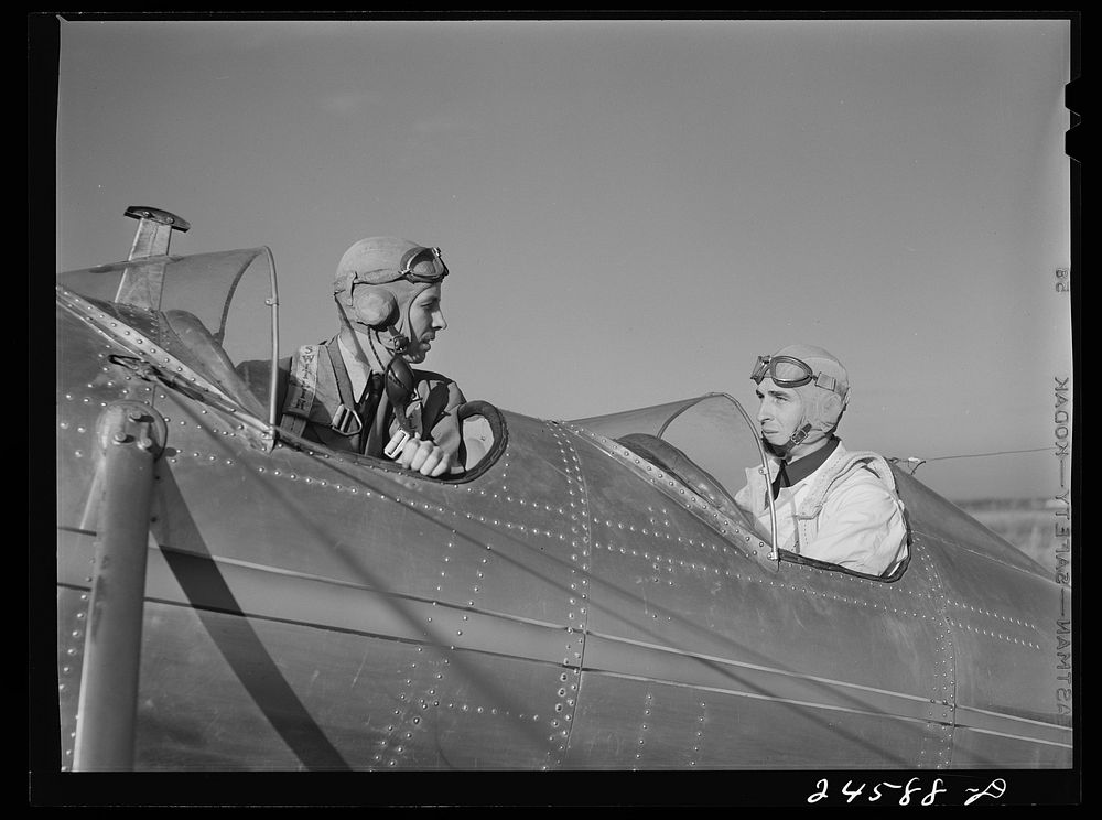 Students and instructor preparing for take off. Meacham Field, Fort Worth, Texas. Sourced from the Library of Congress.