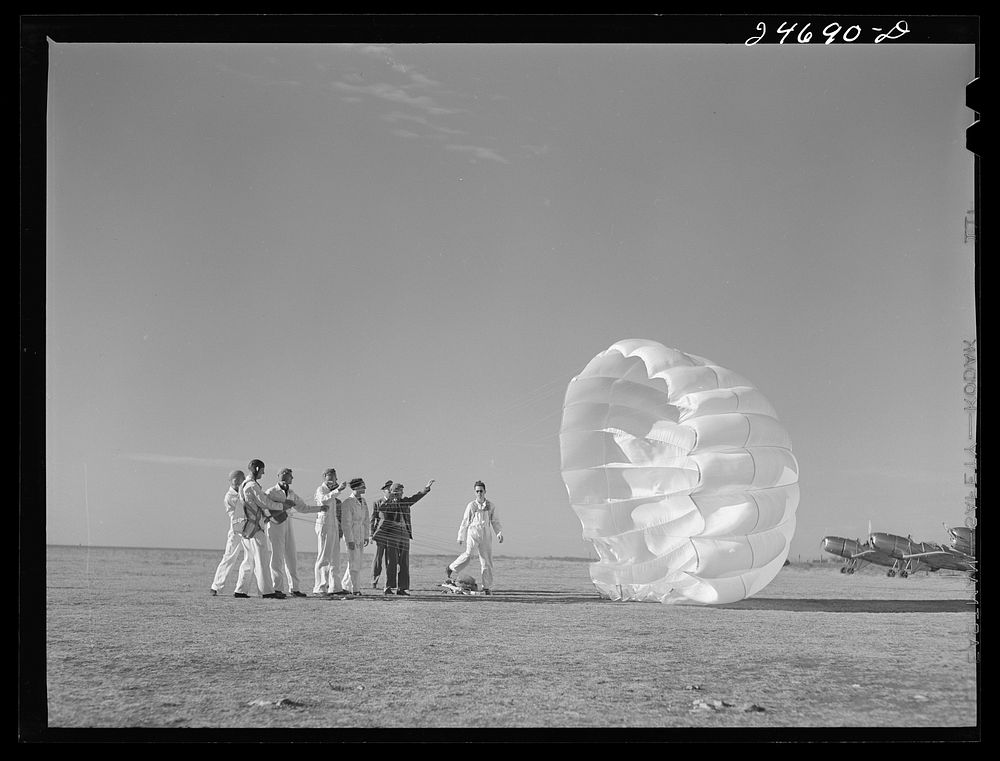 [Untitled photo, possibly related to: Fort Worth, Texas. Meacham Field. Students learning operation of parachute]. Sourced…