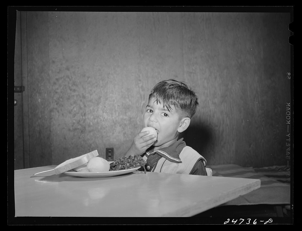 Robstown, Texas. FSA (Farm Security Administration) migratory workers' camp. Children are taught to eat fresh vegetables at…
