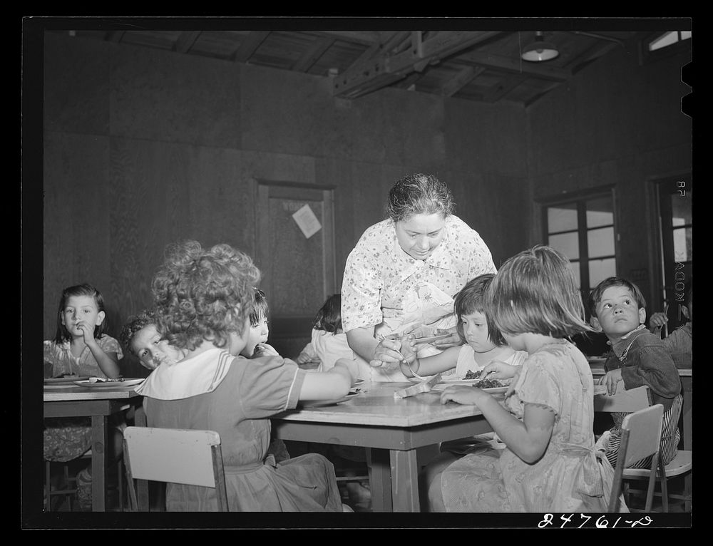 Members of mother's committee serve lunch at nursery school. FSA (Farm Security Administration) camp. Robstown, Texas.…