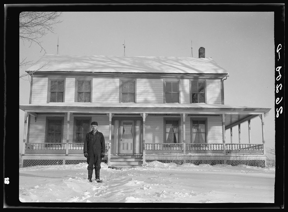 William Wallace, resettled farmer in front of his new home. Oswego County, New York. Sourced from the Library of Congress.