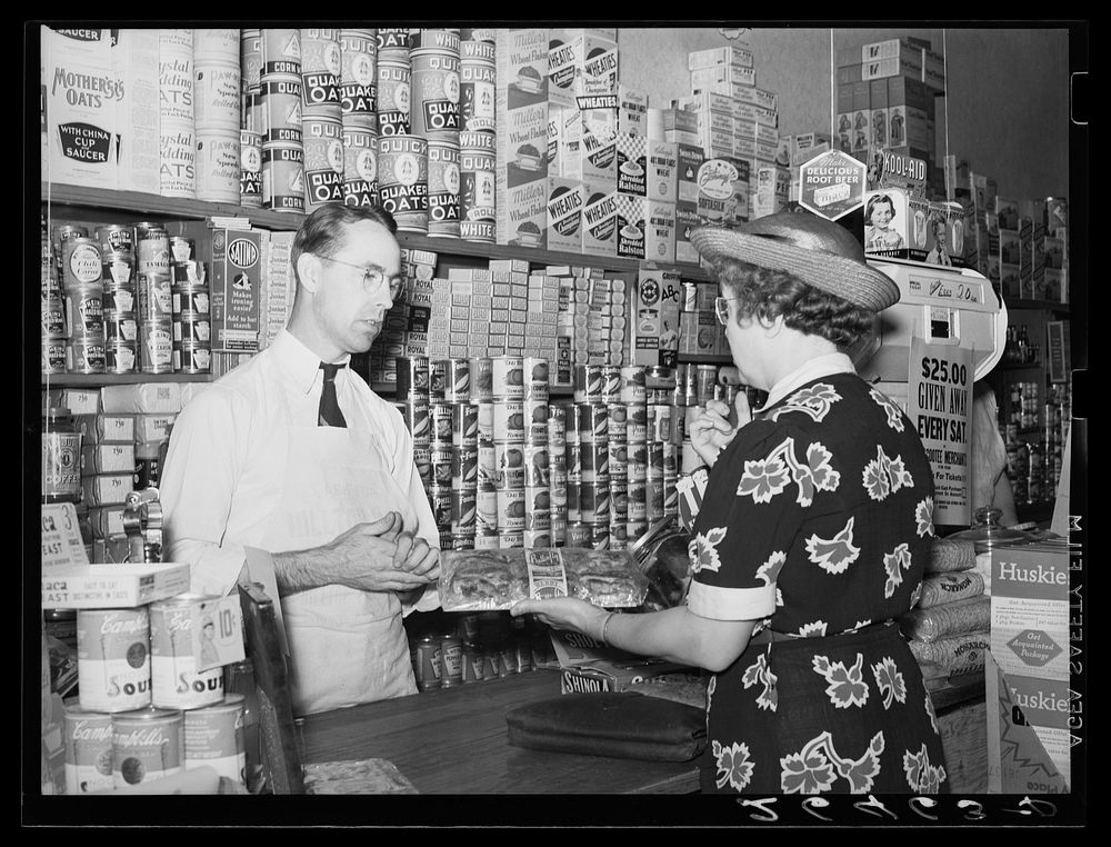 Buying groceries in store at Blankenship, Indiana. Sourced from the Library of Congress.