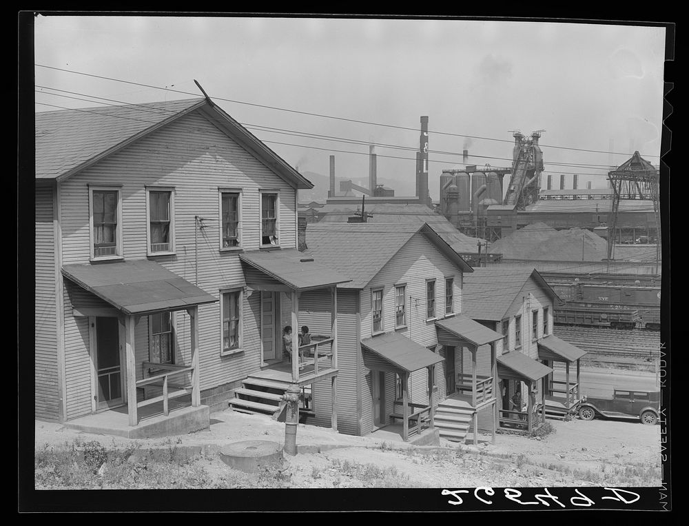 Workers' homes with steel plant in background. Aliquippa, Pennsylvania. Sourced from the Library of Congress.