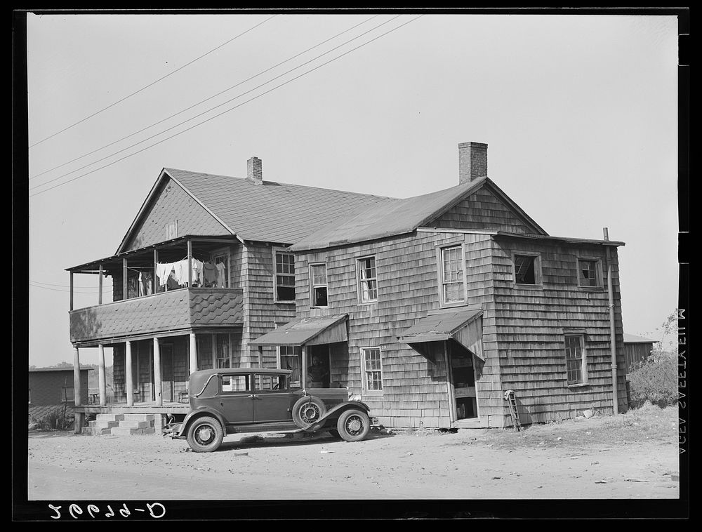 Many migrant potato pickers board at houses in town. Freehold, New Jersey. Sourced from the Library of Congress.