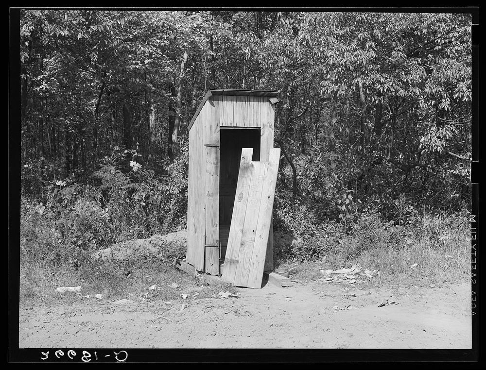 Monmouth County, New Jersey. Privy near potato pickers' barracks used by eleven families. Sourced from the Library of…