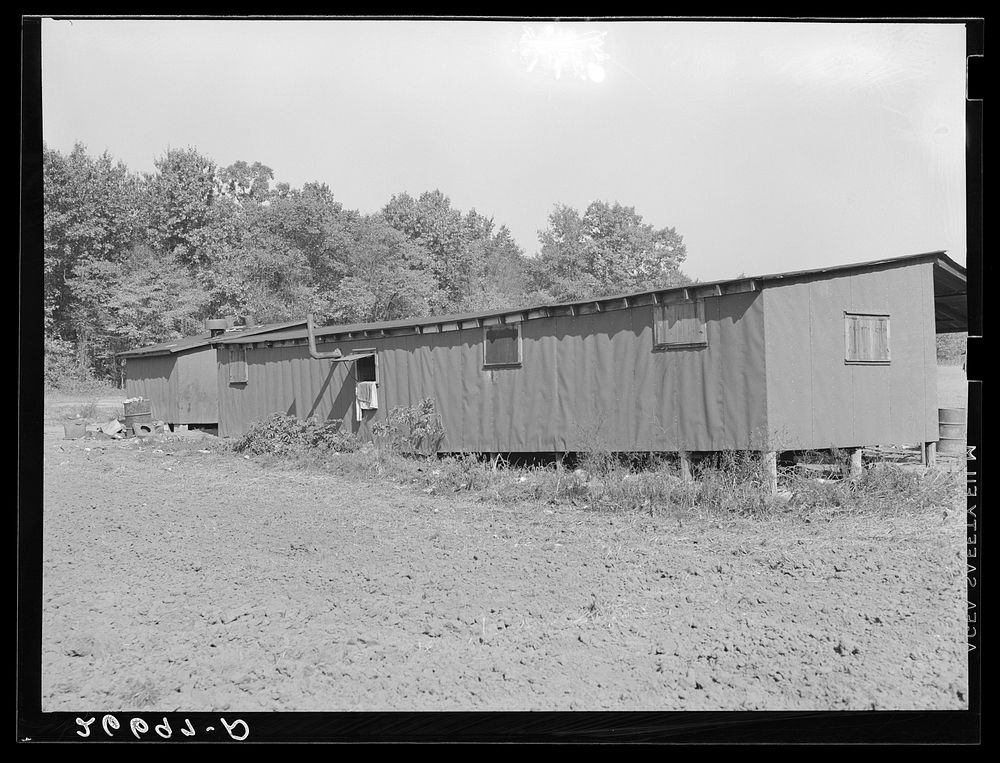 Barracks in which migrant workers are housed during potato picking season. Monmouth County, New Jersey. Sourced from the…