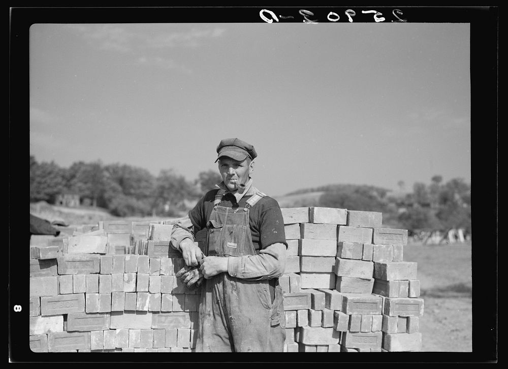Member of Otsego Forest Products Cooperative working on the new modern sawmill. Cooperstown, New York. Sourced from the…