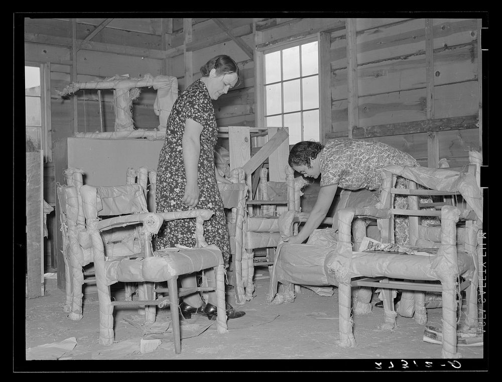 Unpacking new furniture at Fairfield Bench Farms, Montana. Sourced from the Library of Congress.