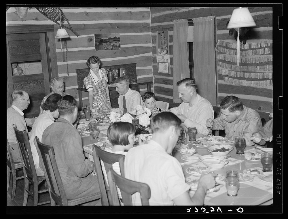 Dudes at dinner. Quarter Circle 'U' Ranch, Montana. Sourced from the Library of Congress.