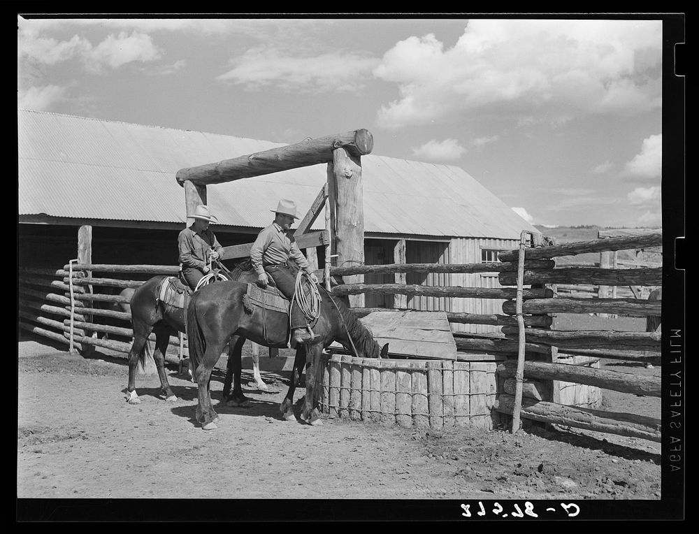 Watering horses. Quarter Circle 'U' Ranch, Montana. Sourced from the Library of Congress.