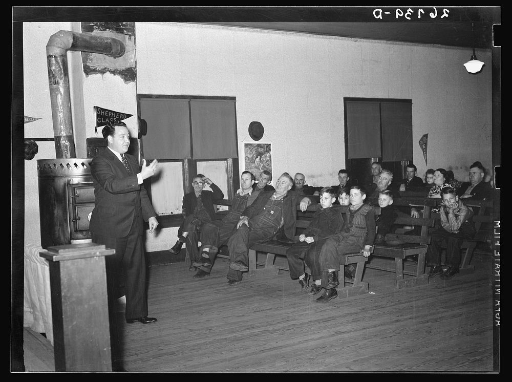 [Untitled photo, possibly related to: Evangelist preaching sermon. Pentecostal church, Cambria, Illinois]. Sourced from the…