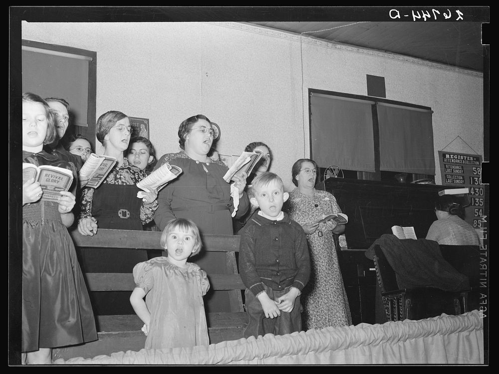 Choir singing at revival meeting in Pentecostal church. Cambria, Illinois. Sourced from the Library of Congress.