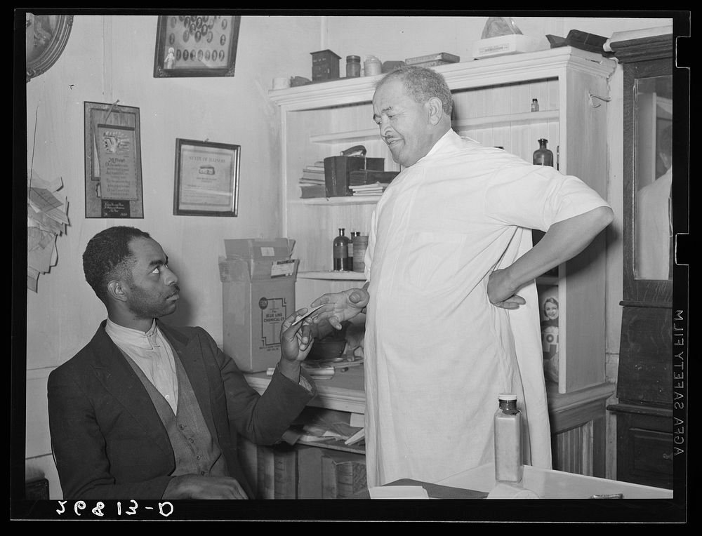 Dr. Springs giving prescription to patient. Colp, Illinois. Sourced from the Library of Congress.