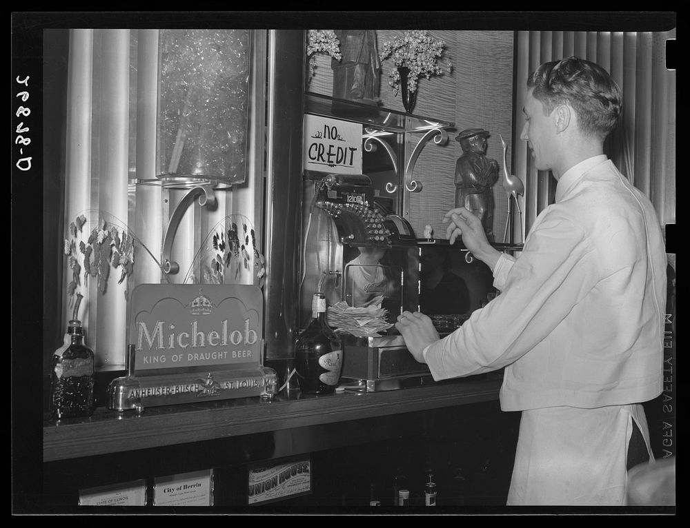 Bartender in Rainbow Room of Ly-Mar Hotel. Herrin, Illinois. Sourced from the Library of Congress.