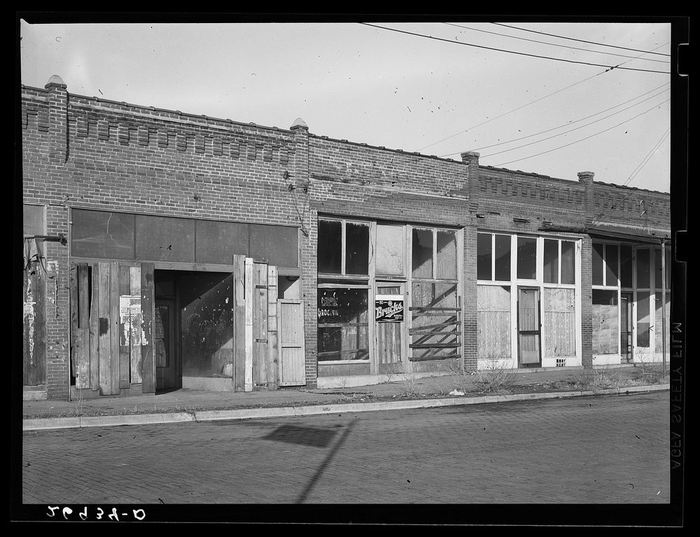 [Untitled photo, possibly related to: Abandoned stores. Cambria, Illinois]. Sourced from the Library of Congress.
