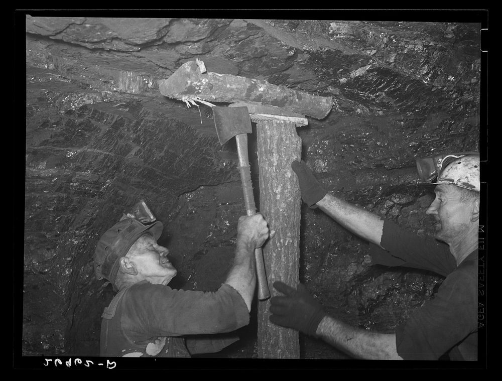 Shoring up the roof of the mine. Old Ben number eight. West Frankfort, Illinois (see 26980-D). Sourced from the Library of…