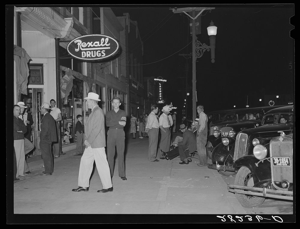 Saturday night on main street. Grundy Center, Iowa. Sourced from the Library of Congress.