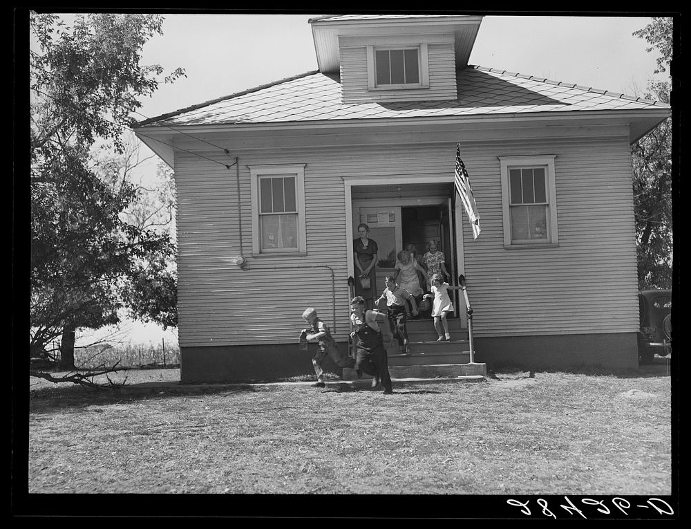 School is out for lunch. Grundy County, Iowa. Sourced from the Library of Congress.
