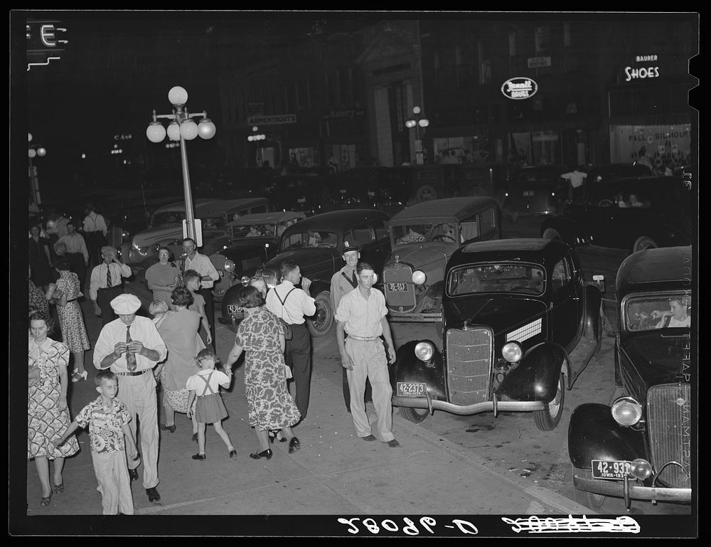 Farmers on main street, Saturday night. Iowa Falls, Iowa. Sourced from the Library of Congress.