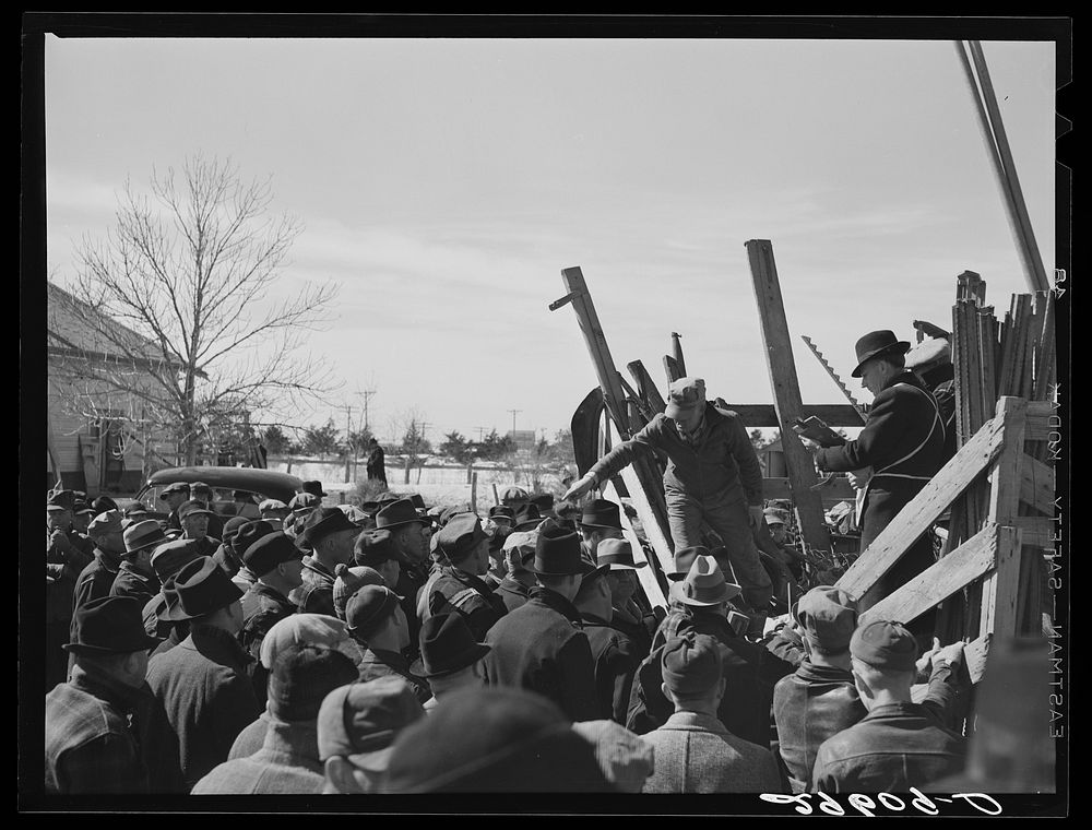 Auctioning farm equipment at Zimmerman farm near Hastings, Nebraska. Sourced from the Library of Congress.