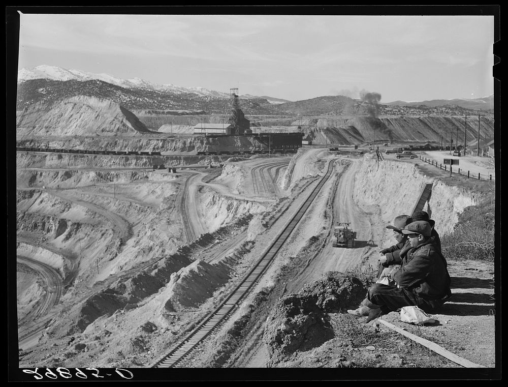 [Untitled photo, possibly related to: Workers sitting at edge of copper pit. Ruth, Nevada]. Sourced from the Library of…