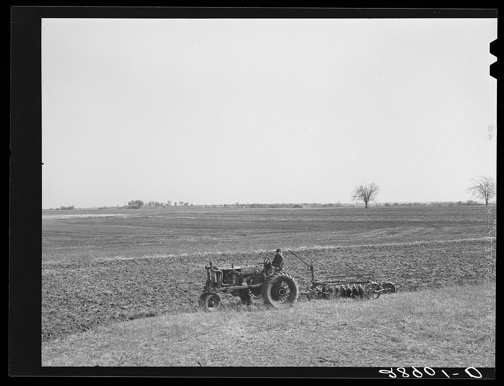 [Untitled photo, possibly related to: Large scale farming with tractors means greater profits on the Bois d'Arc cooperative.…
